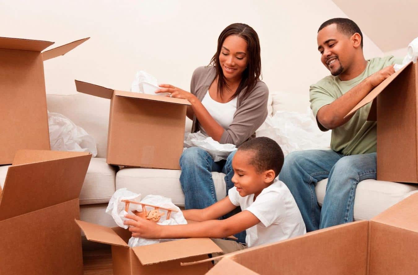 family packing for a move with boxes one corner one sheet more comprehensive coverage best packing materials coffee mugs several sheets moving dishes pack dishes dish boxes bubble wrap pack pack pack pack